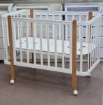 Кроватка детская Indigo "Bella" 120*60 см,колеса, сьемная стенка, цвет белый-натуральный
