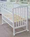 Кроватка детская Indigo "Милана NEW+" колесо/качалка, цвет белый